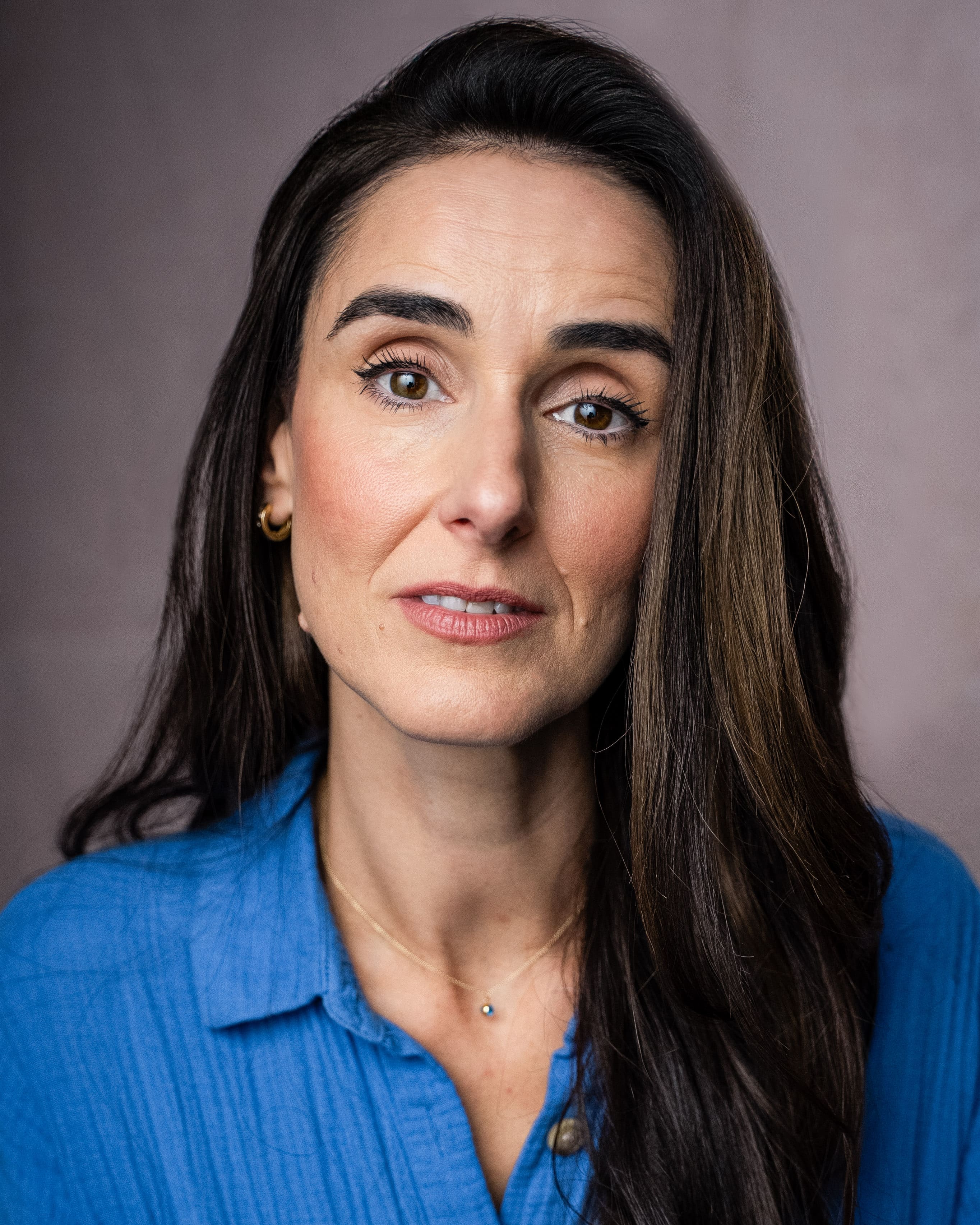 68f8a9da4eabb_Headshot2025 3.jpg